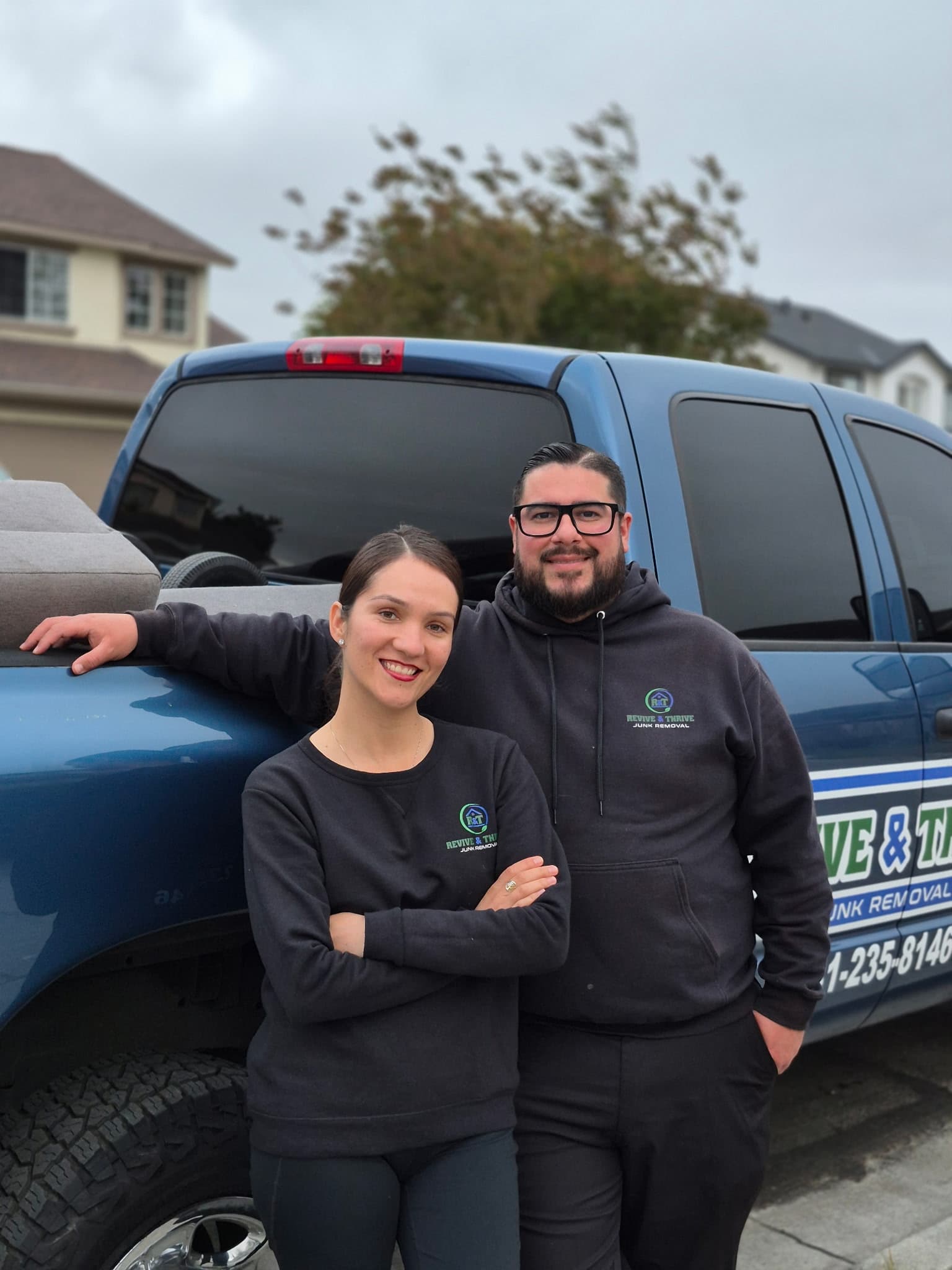 Chrystian and Liz standing in front of the Revive & Thrive truck