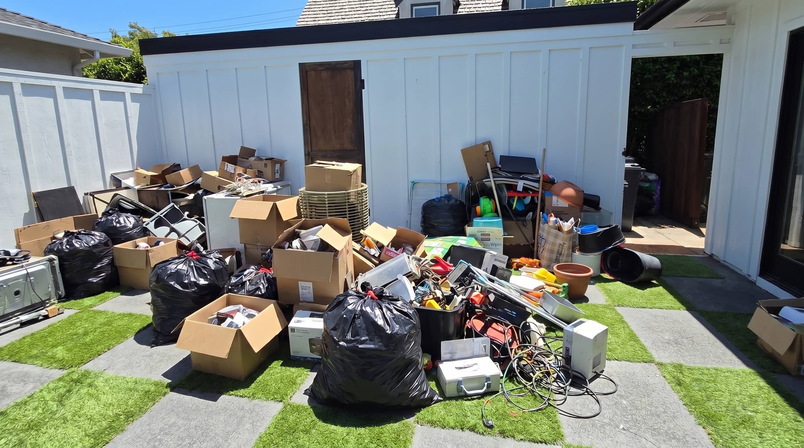Before and after: a cluttered Monterey County backyard cleared out by Revive & Thrive